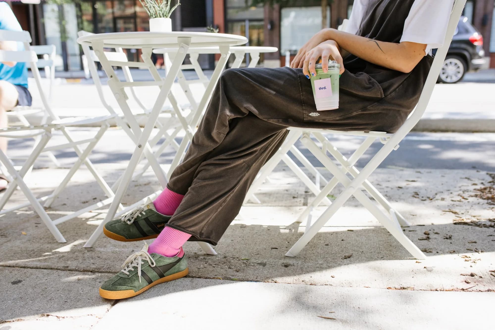 Enjoying coffee outdoors at a pop up mobile coffee stand