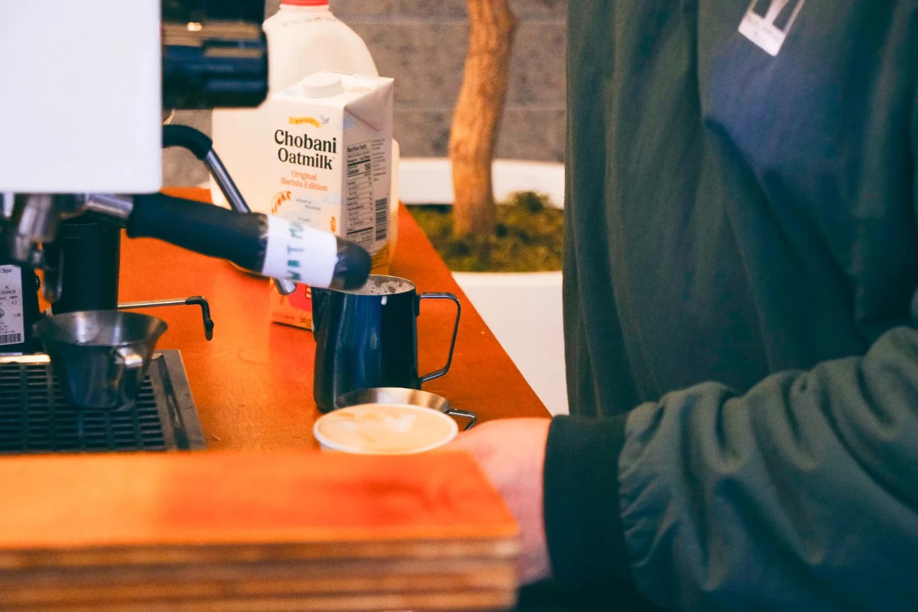 Barista Preparing Latte with Oat Milk at Hines Coffee Social