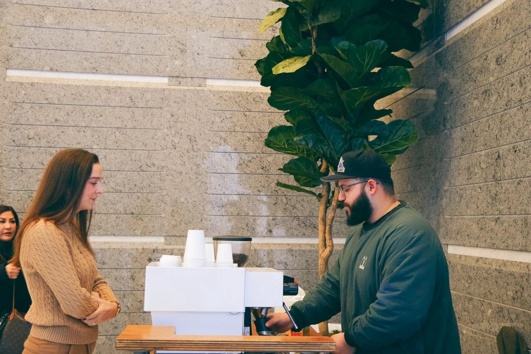 Guest Ordering Coffee from Barista at Hines Coffee Event