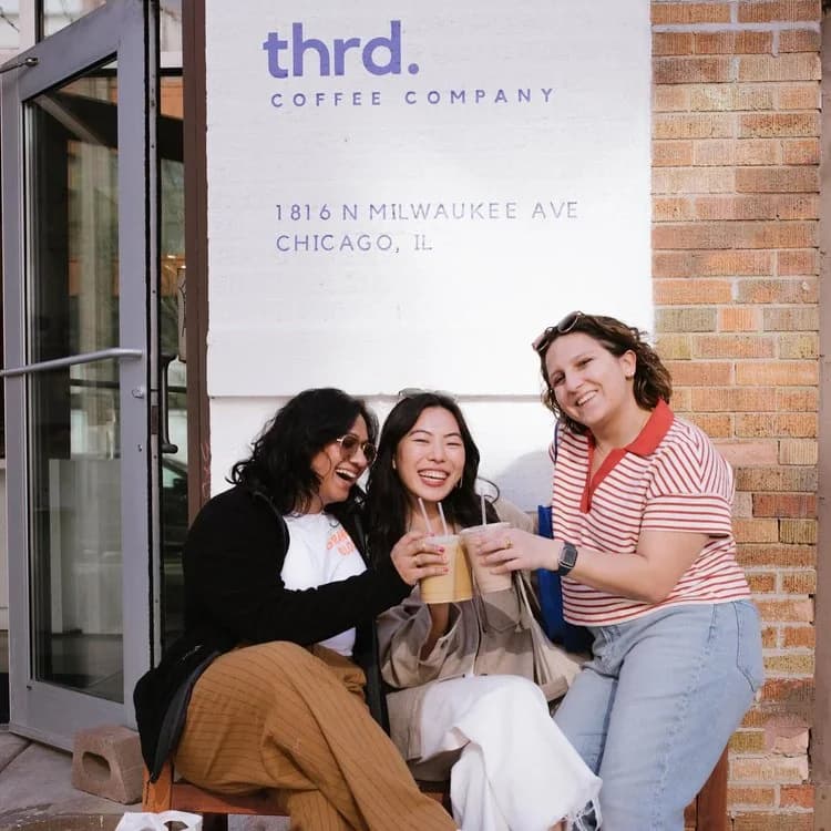 Friends enjoying mobile coffee lattes