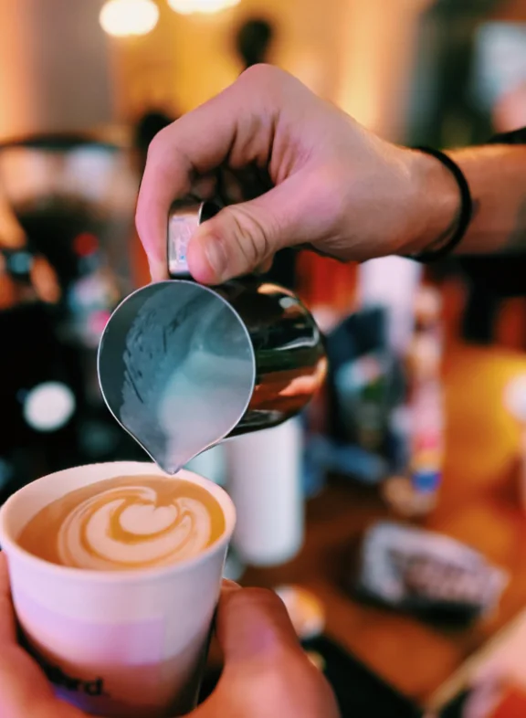 Thrd latte pouring at a coffee catering event